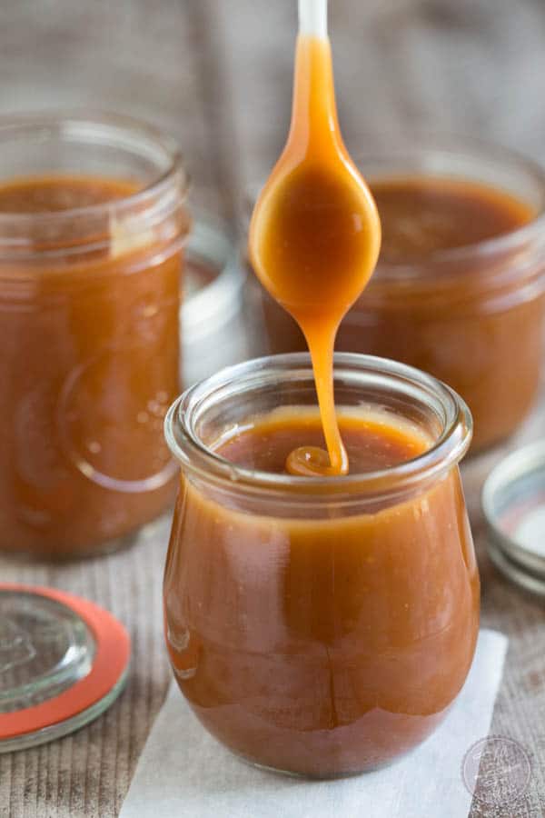 Homemade salted caramel sauce is so easy to make that you won't need to buy it from the store! Make a bunch to store in the fridge for future dessert use!