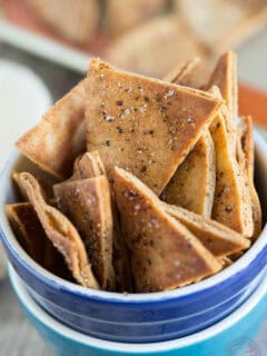 Homemade seasoned pita chips are so easy to make and perfect to pair with your favorite dip and favorite game on TV!