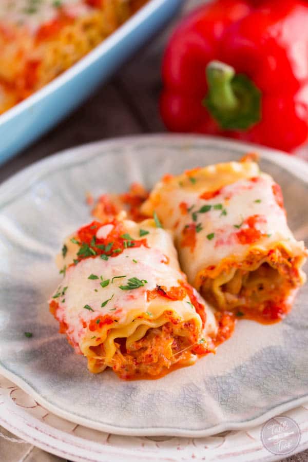 Roasted red pepper chicken lasagna rolls are a flavorful and fun twist on the classic way lasagna! Give these rolls a try!