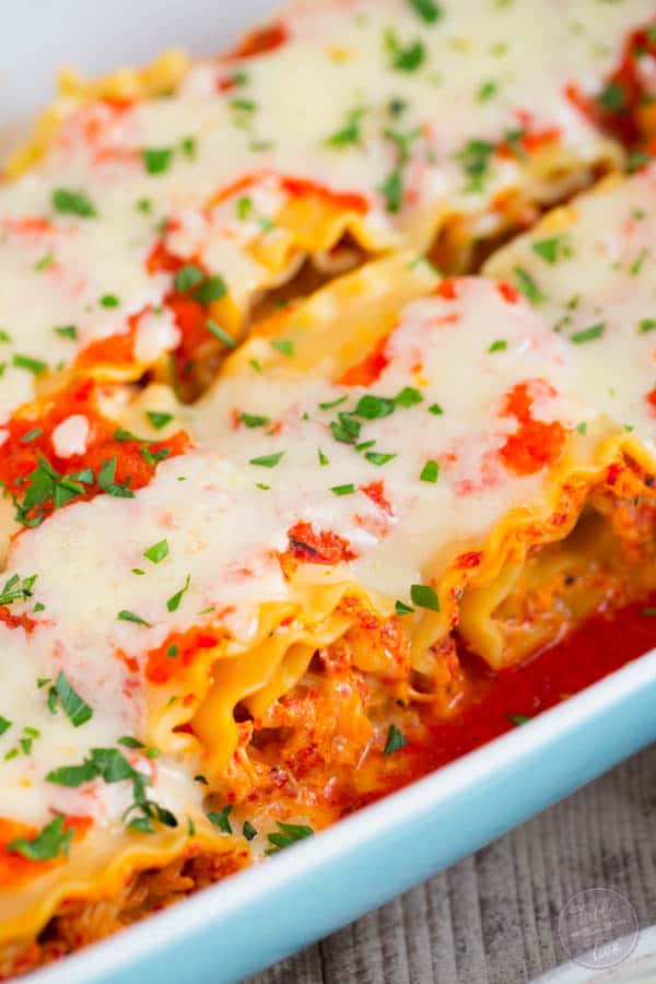 Roasted red pepper chicken lasagna rolls are a flavorful and fun twist on the classic way lasagna! Give these rolls a try!