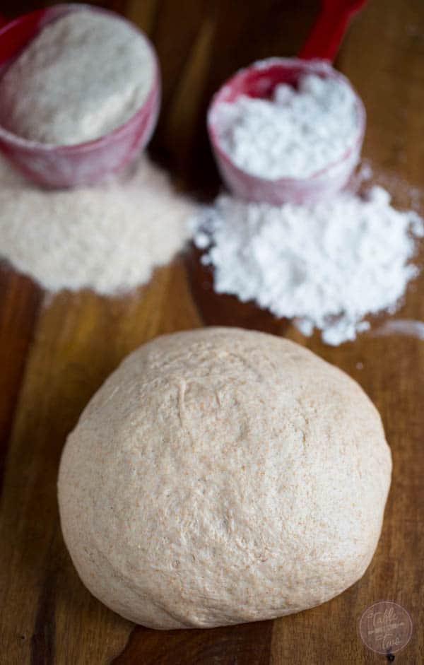 This homemade pizza dough blend combines the best of both worlds! White & whole wheat flours will make this pizza dough blend a staple in your house!