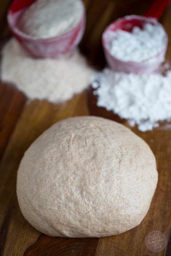 This homemade pizza dough blend combines the best of both worlds! White & whole wheat flours will make this pizza dough blend a staple in your house!