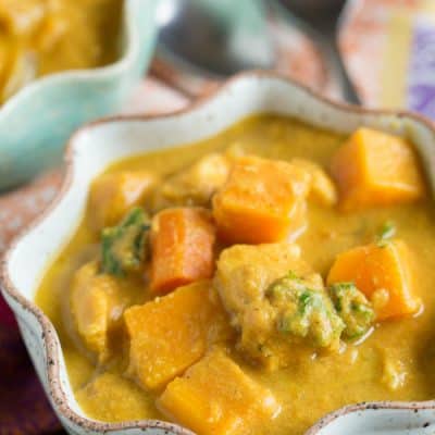 The BEST slow cooker dish you'll have this season! If you love the flavors of Indian cuisine, this is slow cooker pumpkin coconut curry is a KEEPER!