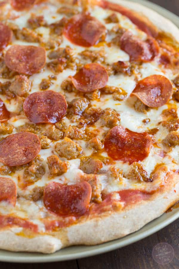 Spicy sausage and pepperoni pizza is so much better made at home than getting delivery! You'll thank me later.