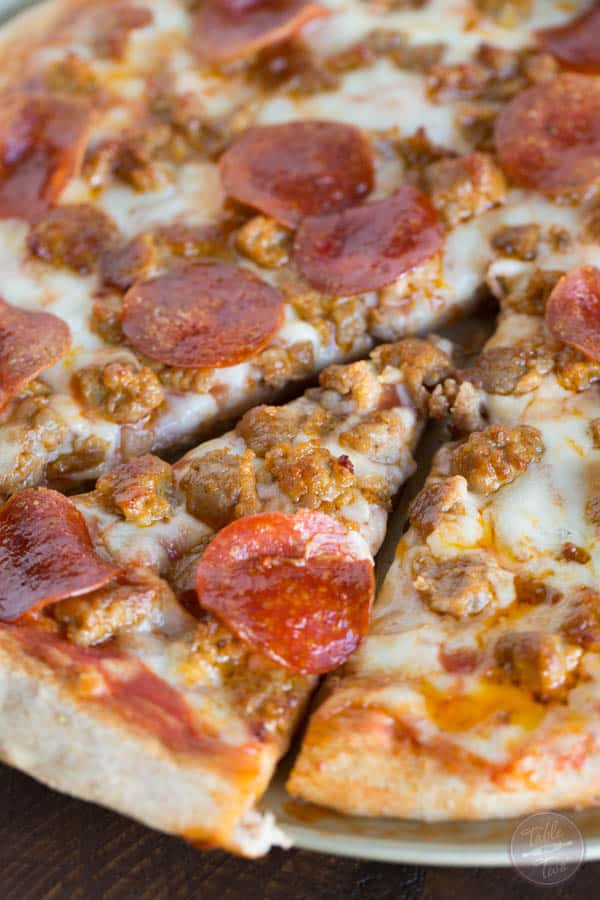 Spicy sausage and pepperoni pizza is so much better made at home than getting delivery! You'll thank me later!