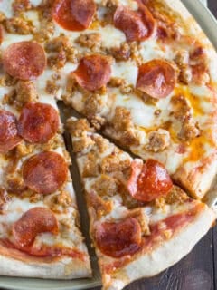 Spicy sausage and pepperoni pizza is so much better made at home than getting delivery! You'll thank me later.