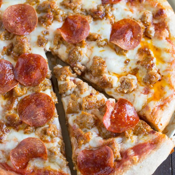 Spicy sausage and pepperoni pizza is so much better made at home than getting delivery! You'll thank me later.