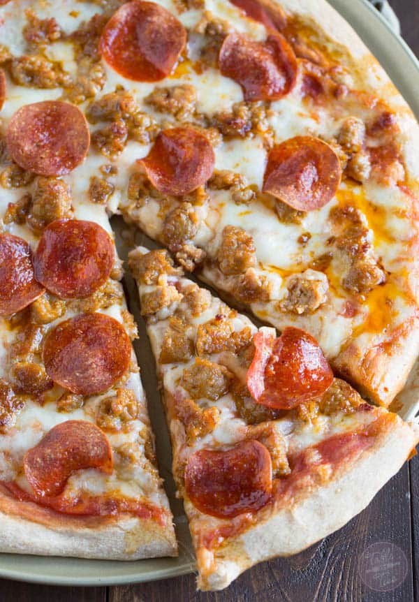 Spicy sausage and pepperoni pizza is so much better made at home than getting delivery!