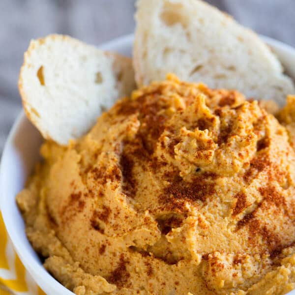 Spiced pumpkin hummus is a great seasonal dip for snack time! A great alternative to the classic hummus!