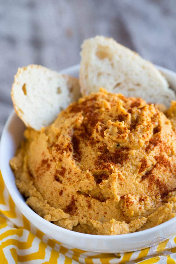 Spiced pumpkin hummus is a great seasonal dip for snack time! A great alternative to the classic hummus!