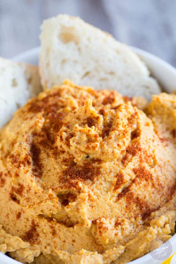 Spiced pumpkin hummus is a great seasonal dip for snack time! A great alternative to the classic hummus!