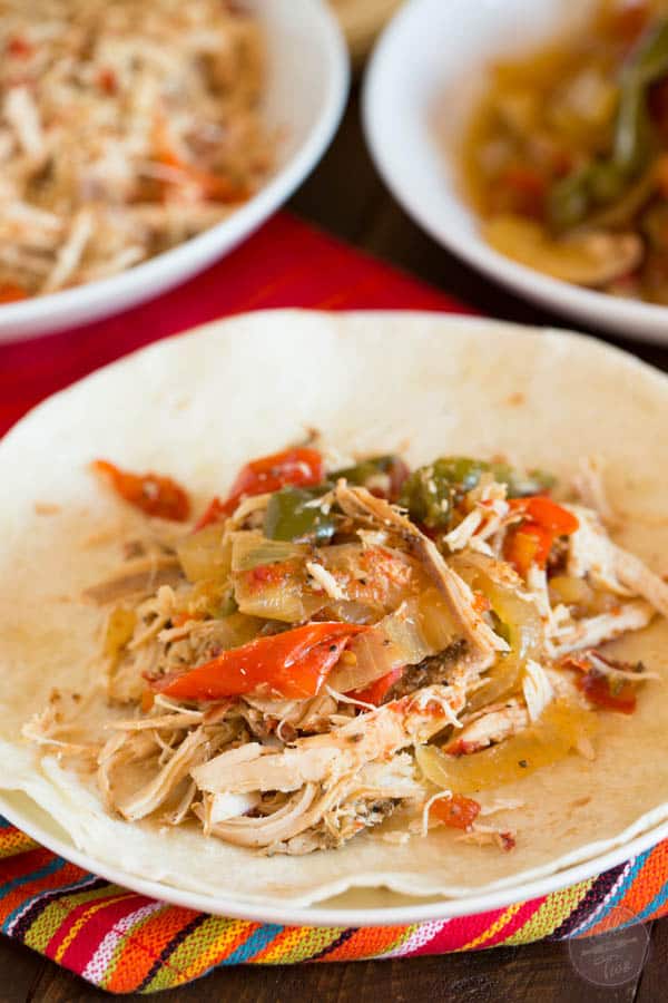 The easiest, no-effort, slow cooker dish ever! Slow cooker chicken fajitas are the PERFECT weeknight meal!!