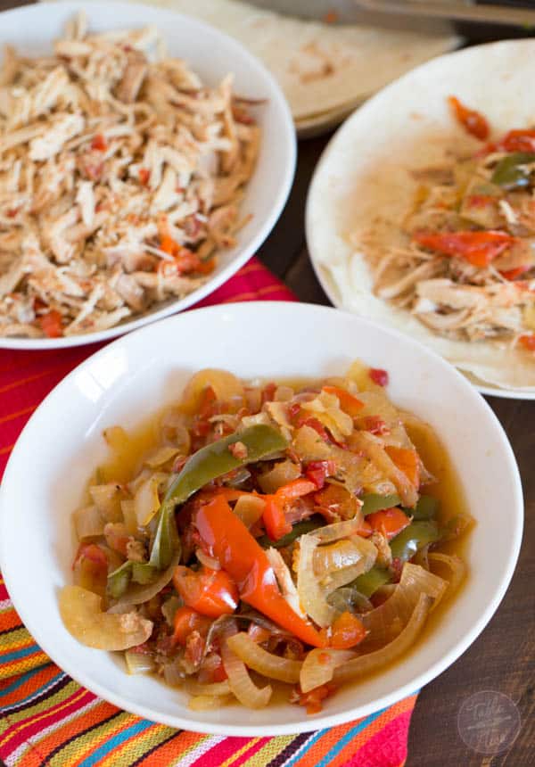 The easiest, no-effort, slow cooker dish ever! Slow cooker chicken fajitas are the PERFECT weeknight meal!!
