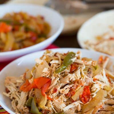 The easiest, no-effort, slow cooker dish ever! Slow cooker chicken fajitas are the PERFECT weeknight meal!!