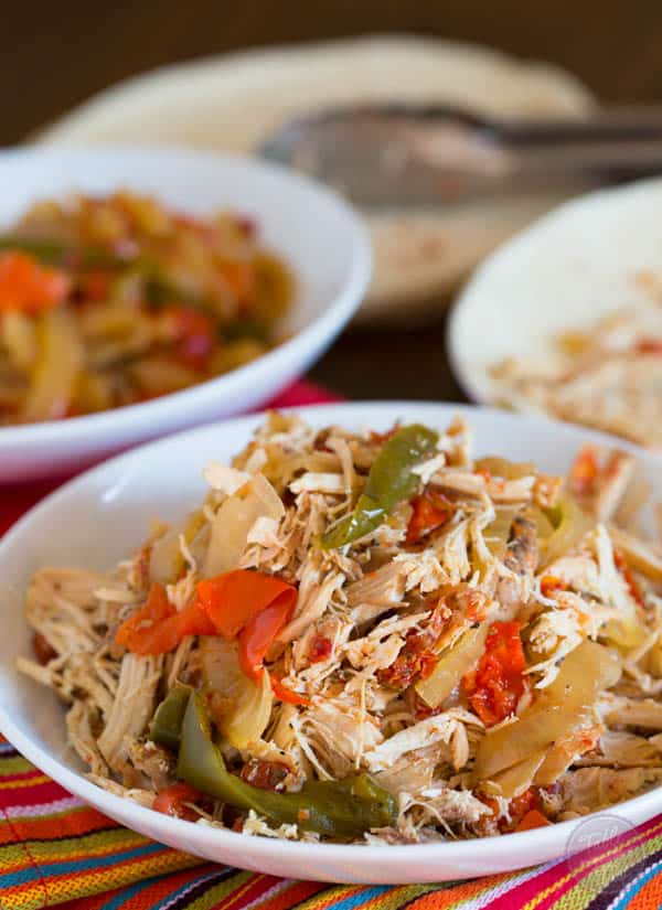 The easiest, no-effort, slow cooker dish ever! Slow cooker chicken fajitas are the PERFECT weeknight meal!!