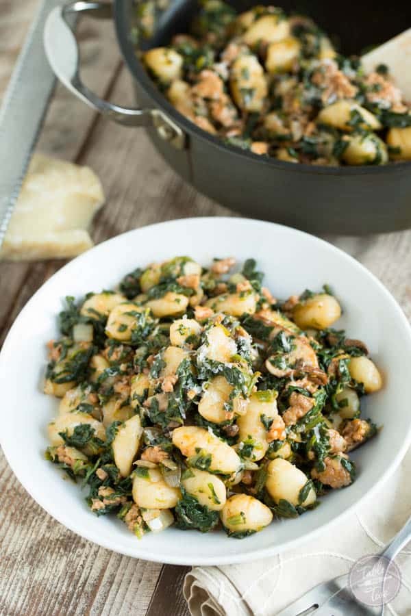 This 15-minute spicy sausage, spinach, and mushroom gnocchi is SO flavorful and incredibly easy to whip up that you'll want it on your dinner table multiple times a week!