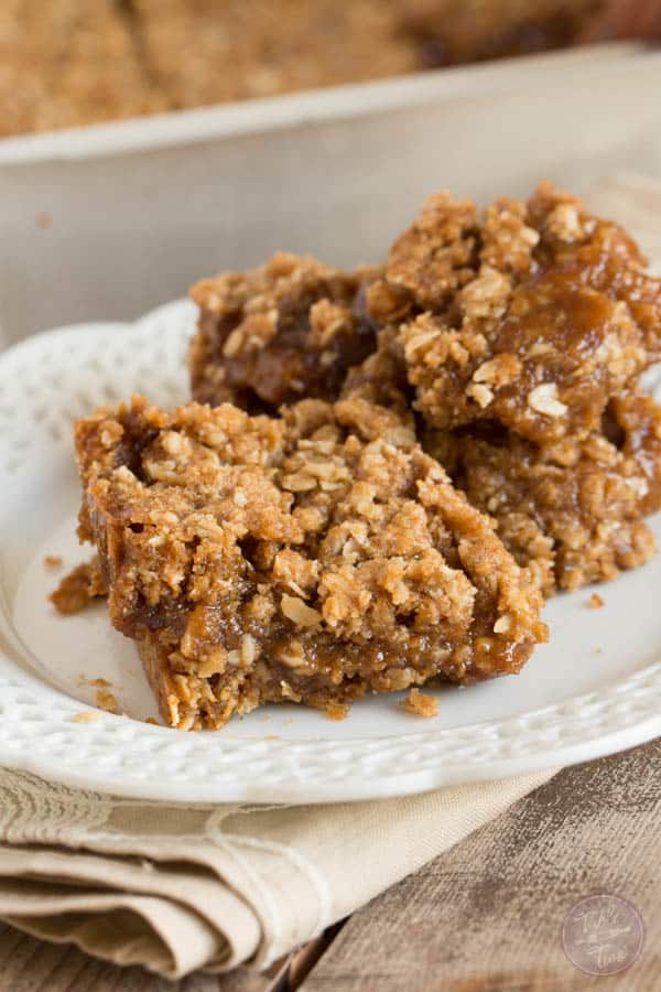 These apple butter salted caramel bars are filled with homemade apple butter & salted caramel that are then baked to perfection! The ultimate Fall dessert..especially if you top it with vanilla ice cream!