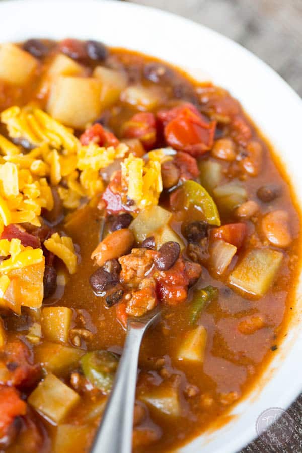 This slow cooker chorizo, potato, and two-bean chili is spicy but fits the bill when you want to warm up on a cold night or craving that fire alarm chili!