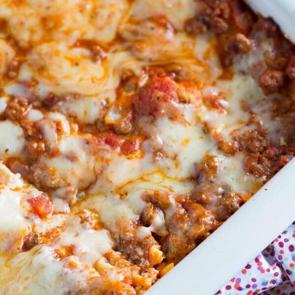 Spicy meaty lasagna is the perfect party casserole! This is a crowd-pleaser! Don't expect to leave with anything left in your casserole dish :)