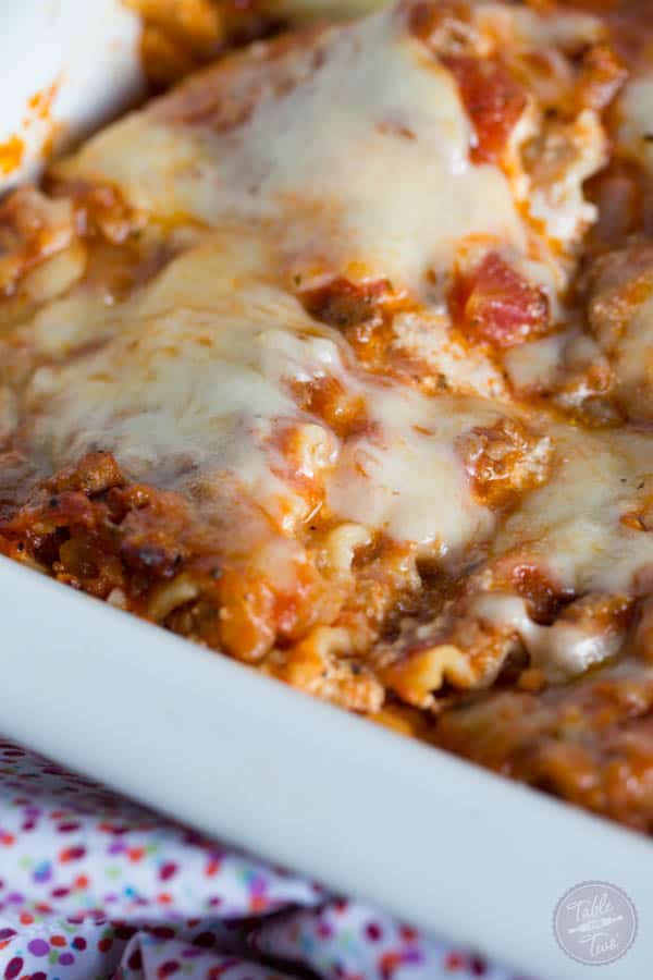 Spicy meaty lasagna is the perfect party casserole! This is a crowd-pleaser! Don't expect to leave with anything left in your casserole dish :)