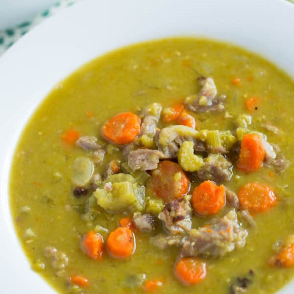 Traditional split pea soup has nothing on this slow cooker smokey ham and split pea soup! It's seriously got the most amazing smokey flavor and so easy to throw together!