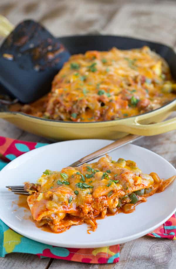 I love enchiladas but I’m not much of a fan of tediously rolling up the individual tortillas. My way around all of that rolling? Stack it up!