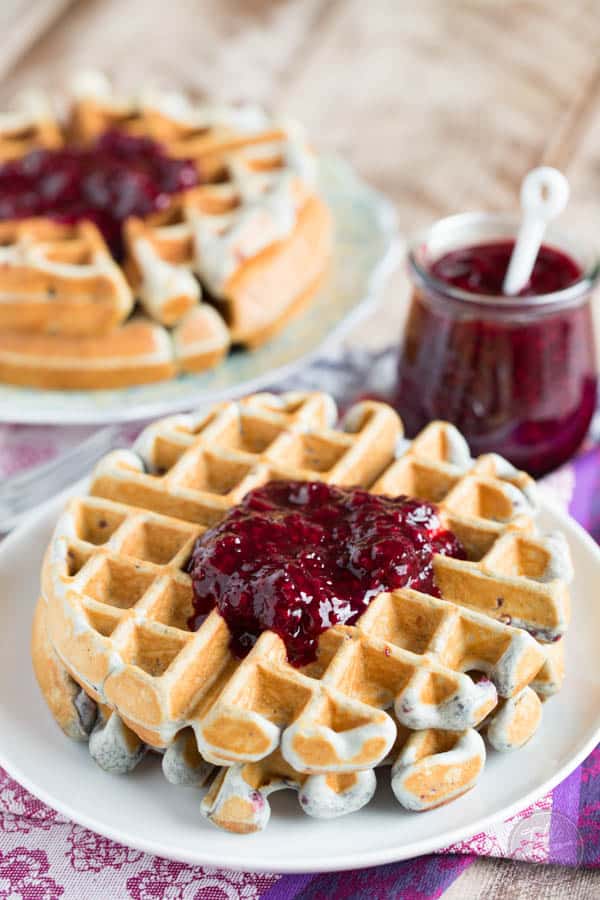 Blackberry lemon waffles make the perfect brunch entree! These waffles are perfectly light and crisp with just the right amount of jam dispersed throughout.