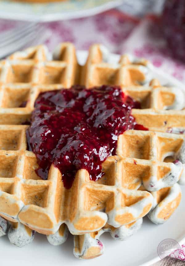 Blackberry lemon waffles make the perfect brunch entree! These waffles are perfectly light and crisp with just the right amount of jam dispersed throughout.