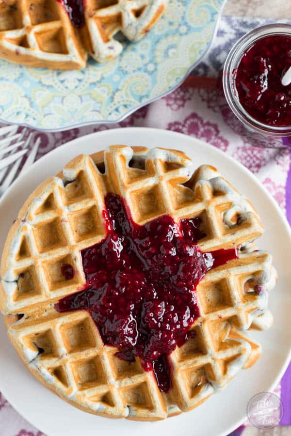 Blackberry lemon waffles make the perfect brunch entree! These waffles are perfectly light and crisp with just the right amount of jam dispersed throughout.