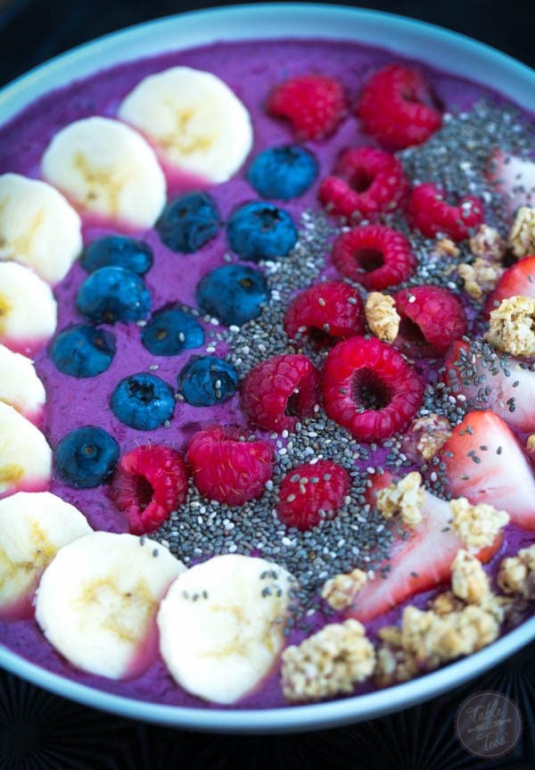 This mixed berry smoothie bowl is a fun new way to "drink" a smoothie while adding your favorite toppings!