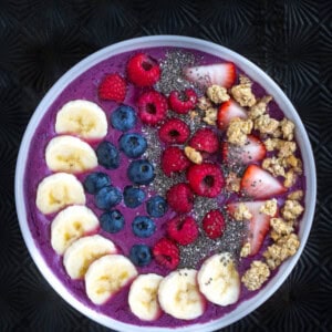 This mixed berry smoothie bowl is a fun new way to "drink" a smoothie while adding your favorite toppings!