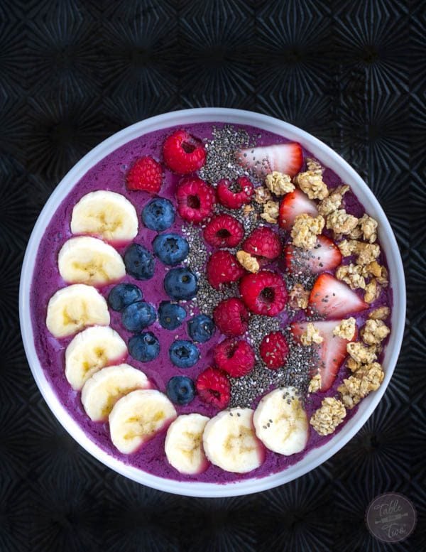 This mixed berry smoothie bowl is a fun new way to "drink" a smoothie while adding your favorite toppings!