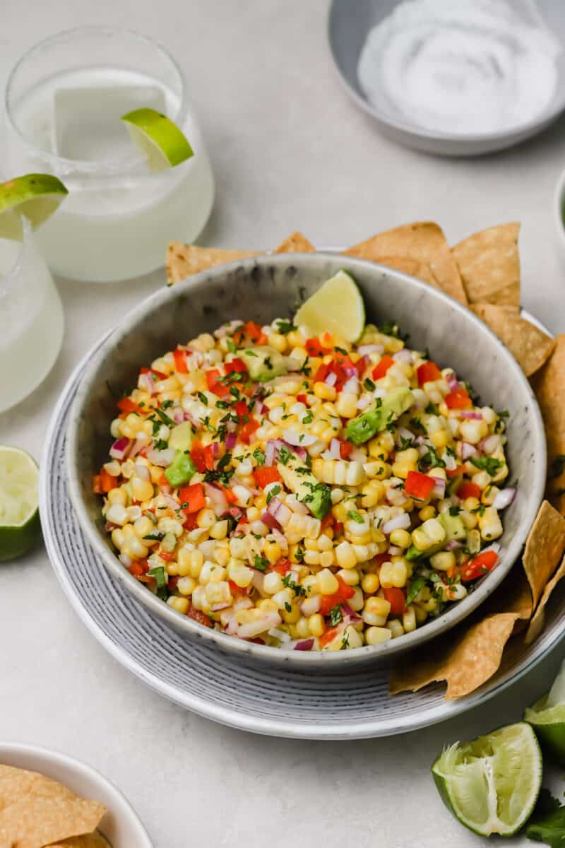 Corn and avocado salsa is an easy side dish to go with any dinner or grilling party! A great way to use up summer's sweetness.