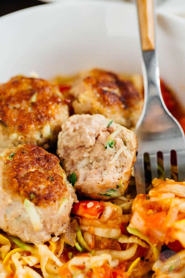 You'll want to make a large batch of these zucchini turkey meatballs. They're SO moist and you can freeze half the meatballs then use them to top over a savory zoodle dish later! Paleo-friendly never tasted so good!
