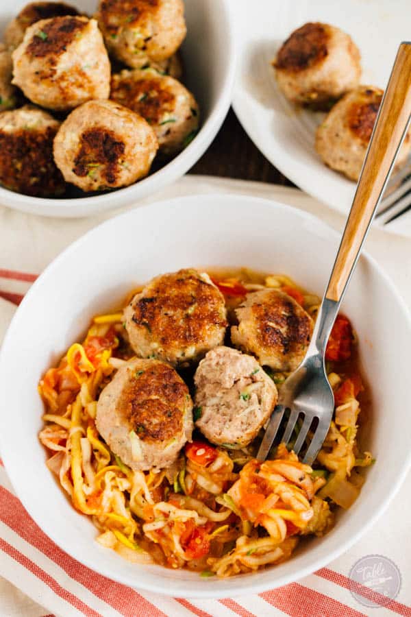 You'll want to make a large batch of these zucchini turkey meatballs. They're SO moist and you can freeze half the meatballs then use them to top over a savory zoodle dish later! Paleo-friendly never tasted so good!