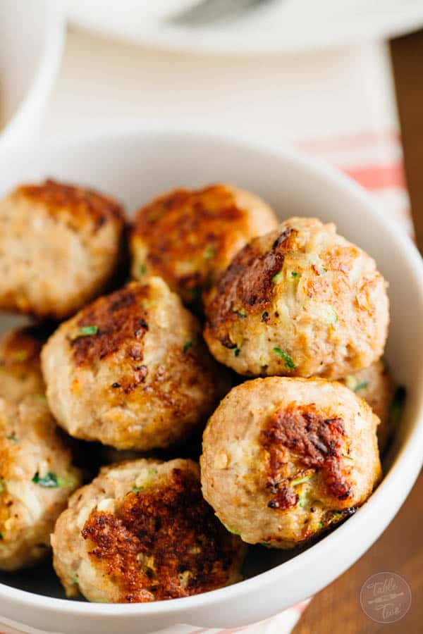 You'll want to make a large batch of these zucchini turkey meatballs. They're SO moist and you can freeze half the meatballs then use them to top over a savory zoodle dish later! Paleo-friendly never tasted so good!