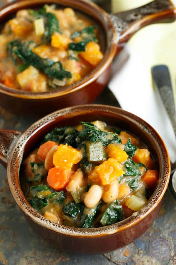Warm up for game time with this dairy-free and meatless butternut squash white bean kale stew! This recipe is full of hearty veggies! Can we say touchdown?! #MeatlessMondayNight #ad #dairyfree