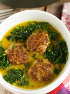 This deliciously comforting curry meatball and kale stew is a paleo-friendly dish that you'll want to make over and over again! Perfect for any night of the week and any season!