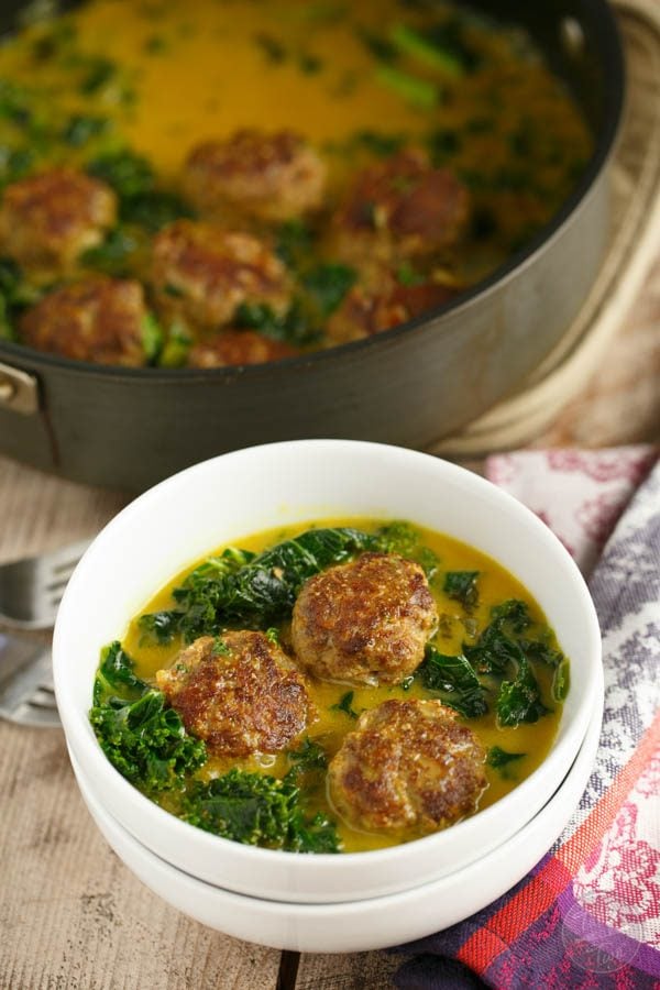 This deliciously comforting curry meatball and kale stew is a paleo-friendly dish that you'll want to make over and over again! Perfect for any night of the week and any season!