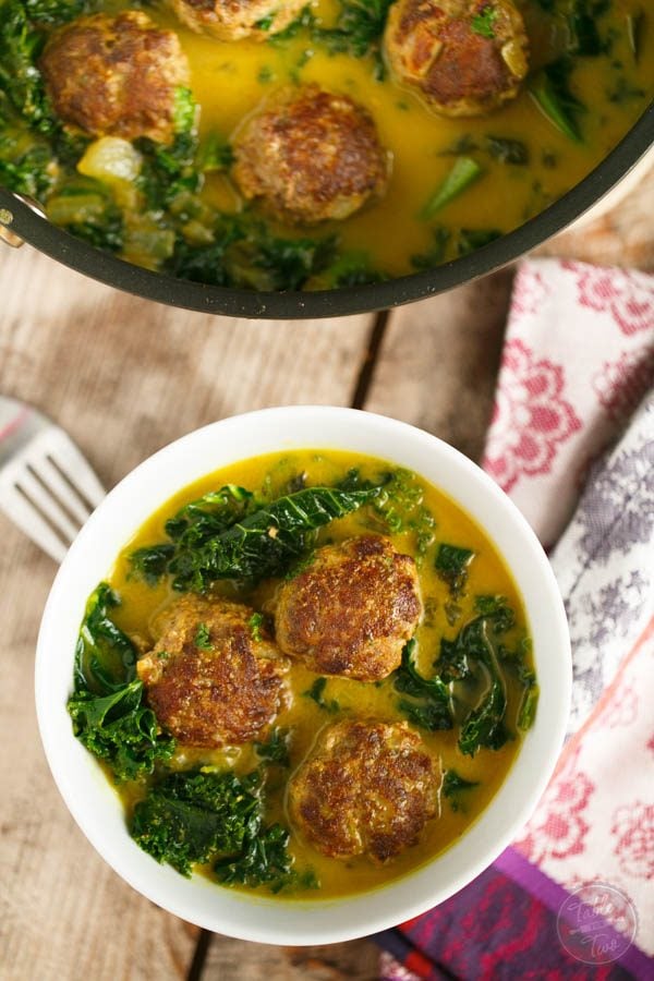 This deliciously comforting curry meatball and kale stew is a paleo-friendly dish that you'll want to make over and over again! Perfect for any night of the week and any season!