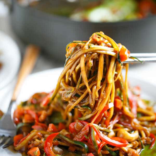 This easy zucchini noodle cashew stir fry made with The Inspiralizer will have you licking your plate clean! Dinner comes together in less than 30 minutes and you'll want to put this sauce on every meal! #inspiralizer