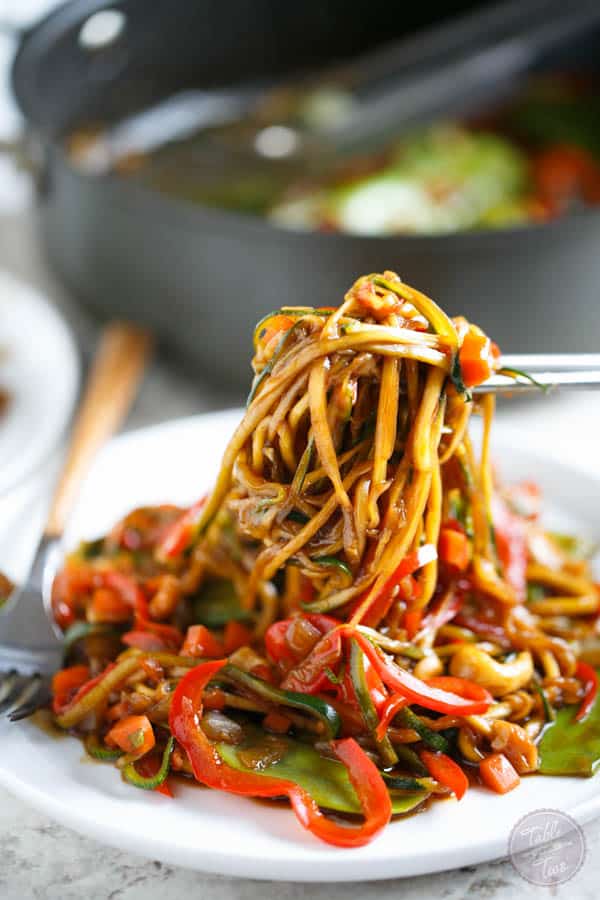 This easy zucchini noodle cashew stir fry made with The Inspiralizer will have you licking your plate clean! Dinner comes together in less than 30 minutes and you'll want to put this sauce on every meal! #inspiralizer