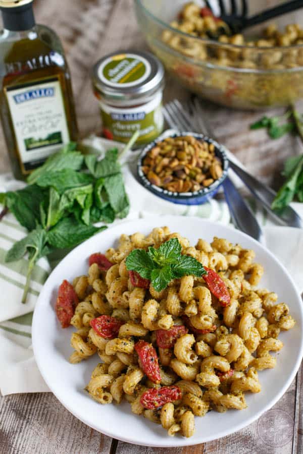 Pistachio mint pesto pasta will make you wonder where it has been all your life and it will be the only pesto you want to make! Less than 30 minutes gets this flavorful pasta dish on your dinner table! #sponsored
