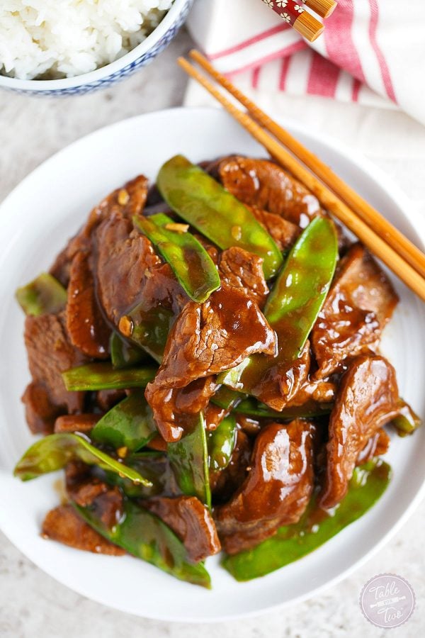 Short on time? This 25-minute beef and snow pea stir fry is the perfect weeknight dinner option!