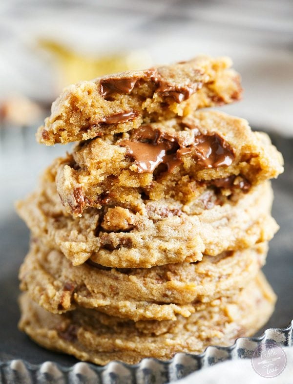 Peanut butter overload cookies are a peanut butter lovers' dream! Studded with Reese's peanut butter cups throughout, this cookie is so soft and perfect for all peanut butter and chocolate lovers!