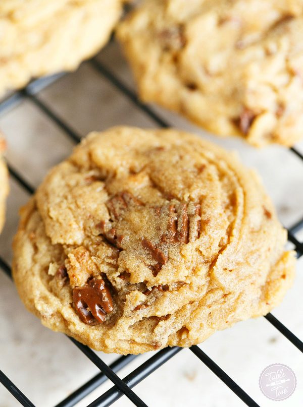 Peanut butter overload cookies are a peanut butter lovers' dream! Studded with Reese's peanut butter cups throughout, this cookie is so soft and perfect for all peanut butter and chocolate lovers!