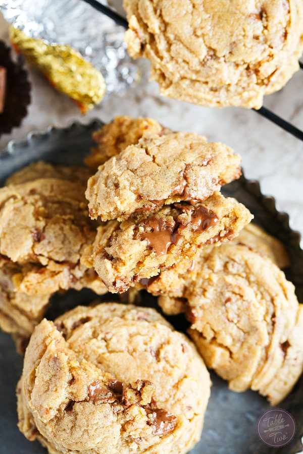 Peanut butter overload cookies are a peanut butter lovers' dream! Studded with Reese's peanut butter cups throughout, this cookie is so soft and perfect for all peanut butter and chocolate lovers!