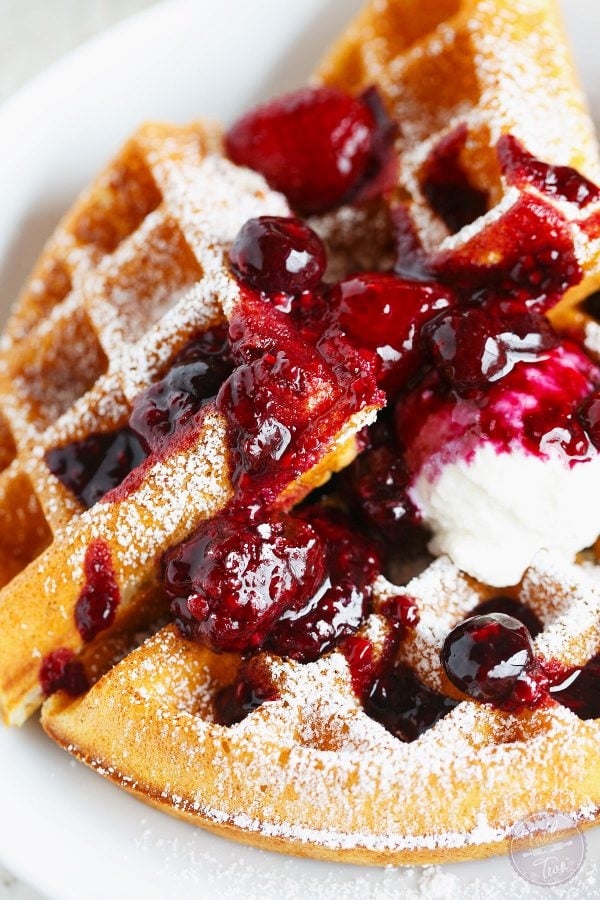 You'll never make waffles any other way again after you've tried these yeasted berry waffles. The yeasted waffles are ultra light, crispy, & even custardy! You will want to make a giant batch of this mix for future brunches!