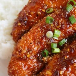 Crispy Sweet and Spicy Chicken Tenders placed on top of rice is delicious way to spice up your weeknight dinner with @soyvay! #teamrice all the way! #UnlocktheAwesome #sponsored