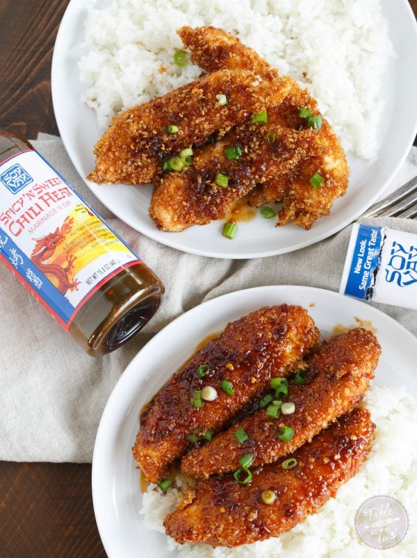 Crispy Sweet and Spicy Chicken Tenders placed on top of rice is delicious way to spice up your weeknight dinner with @soyvay! #teamrice all the way! #UnlocktheAwesome #sponsored